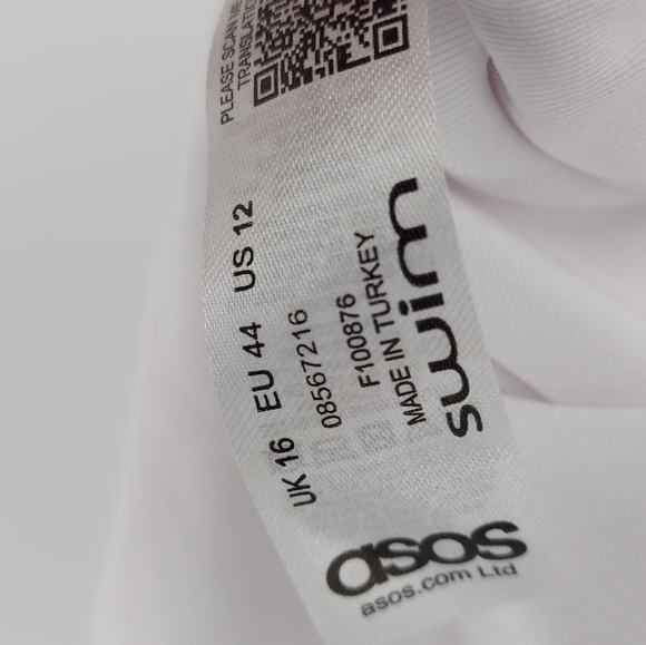 ASOS DESIGN skinny strap deep plunge tie front swimsuit in shiny white - Picture 8 of 9